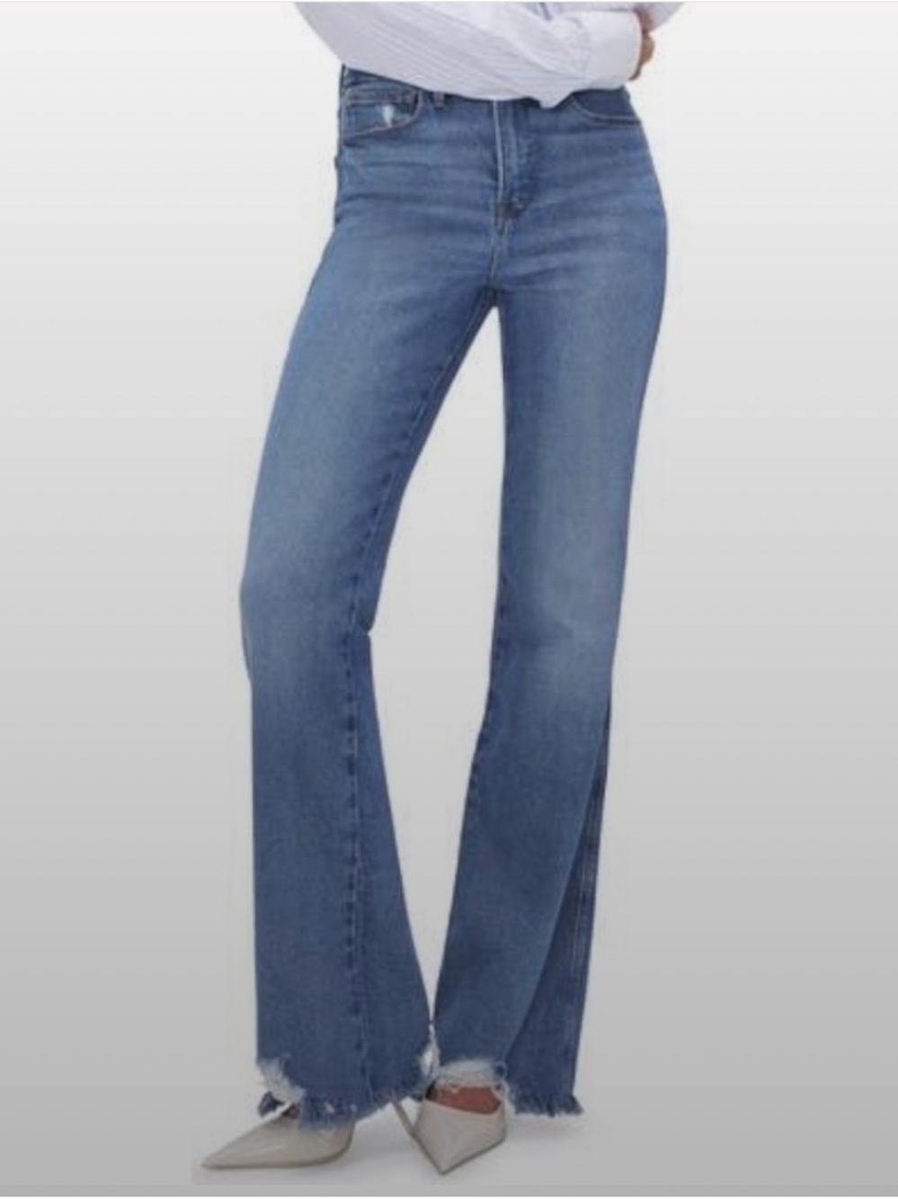 Good American Boot Cut Jeans in Light Blue with Frayed Hem